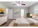 Well-decorated main bedroom featuring lots of natural light, modern decor, and a plush bed at 803 Cedar Lake Se Dr, Conyers, GA 30094
