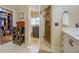 Bathroom with walk-in shower, walk-in closet, and plenty of storage space, offering functionality and style at 95 Weslyan Way, Oxford, GA 30054