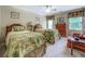 Comfortable bedroom featuring two twin beds, natural light, and tasteful decor at 95 Weslyan Way, Oxford, GA 30054