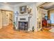 Elegant fireplace with decorative mantel, creating a cozy and inviting atmosphere in the living space at 95 Weslyan Way, Oxford, GA 30054