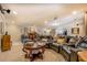 Relaxing living room with comfortable leather seating, a large entertainment center, and lots of space to entertain at 95 Weslyan Way, Oxford, GA 30054