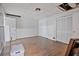 Large finished basement with wood-look tile flooring and white-painted walls at 1777 E Gate Trl, Stone Mountain, GA 30087