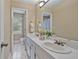 Bathroom with double vanity and white cabinetry at 1777 E Gate Trl, Stone Mountain, GA 30087