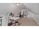 Bonus room with sloped ceilings, carpeted floors and good natural light at 1777 E Gate Trl, Stone Mountain, GA 30087