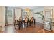 Elegant dining room with stylish furnishings and wood floors at 1777 E Gate Trl, Stone Mountain, GA 30087