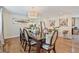 Well-lit dining room with hardwood floors and modern decor at 1777 E Gate Trl, Stone Mountain, GA 30087
