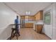 Spacious kitchen features stainless steel appliances, wooden cabinets, and tile flooring at 1777 E Gate Trl, Stone Mountain, GA 30087