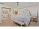 A beautifully decorated main bedroom leading to the bathroom boasts a decorative headboard and plush bedding at 1777 E Gate Trl, Stone Mountain, GA 30087