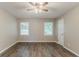 Bedroom with a ceiling fan and hardwood floor at 4248 Wellington Hills Ln, Snellville, GA 30039