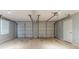 Spacious two-car garage with two overhead doors and ample room for storage at 4248 Wellington Hills Ln, Snellville, GA 30039