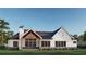 Back of this beautiful home featuring a cozy outdoor space with ample windows and natural light at 1779 Granade Sw Rd, Conyers, GA 30094