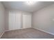 Bedroom with neutral carpet and large double door closet at 220 Harwell Nw Rd, Atlanta, GA 30331