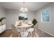 Bright dining room with modern lighting and table setting at 220 Harwell Nw Rd, Atlanta, GA 30331