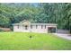 Charming single-story home with a well-maintained lawn and front porch at 220 Harwell Nw Rd, Atlanta, GA 30331