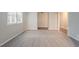 Spacious living room with plush carpet and a bright, airy atmosphere at 220 Harwell Nw Rd, Atlanta, GA 30331