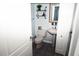 Well-maintained bathroom features a vanity, toilet, and decorative shelves at 3475 Oak Valley Ne Rd # 980, Atlanta, GA 30326