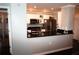 This kitchen is equipped with black countertops and ample cabinet storage at 3475 Oak Valley Ne Rd # 980, Atlanta, GA 30326