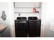 Modern laundry room with front loading washer and dryer units at 3475 Oak Valley Ne Rd # 980, Atlanta, GA 30326