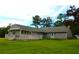 View of the large back deck and screened in porch at 4841 Partee Trl, Social Circle, GA 30025