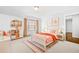 A bedroom featuring bright decor, white furniture, and a cozy rug over carpet at 667 Creswell Park, Smyrna, GA 30082