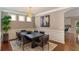 Formal dining room showcases elegant wainscoting and modern decor at 667 Creswell Park, Smyrna, GA 30082