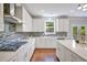 Beautiful kitchen with white countertops, stainless steel appliances, and plenty of cabinet space at 667 Creswell Park, Smyrna, GA 30082