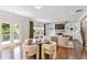 Bright living room boasts hardwood floors, built-in shelves, and a fireplace at 667 Creswell Park, Smyrna, GA 30082