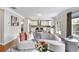 Bright, open concept living space connects to the kitchen for modern living at 667 Creswell Park, Smyrna, GA 30082
