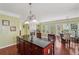 Open floorplan featuring kitchen with a central island that connects to the living area at 251 Sumac Trl, Woodstock, GA 30188