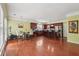Open kitchen design with a central island, breakfast bar, and hardwood floors at 251 Sumac Trl, Woodstock, GA 30188