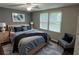 Cozy bedroom with a calming color scheme, natural light, and minimalist décor for a peaceful retreat at 2691 Old South Dr, Jonesboro, GA 30236