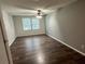 Bedroom featuring neutral walls, wood flooring and natural light from the windows at 2691 Old South Dr, Jonesboro, GA 30236