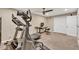 Basement featuring an exercise bike, desk, and storage, creating an organized and functional area at 3150 Seven Oaks Dr, Cumming, GA 30041