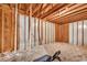 Unfinished basement with exposed framing, ready for customization at 3150 Seven Oaks Dr, Cumming, GA 30041