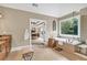 Bathroom featuring a soaking tub with a window view and a glass shower with access to main bedroom at 3150 Seven Oaks Dr, Cumming, GA 30041