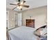 Well lit bedroom with a ceiling fan and dresser, showing a comfortable and inviting space at 3150 Seven Oaks Dr, Cumming, GA 30041