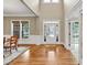 Bright foyer with high ceilings, hardwood floors, and elegant architectural details at 3150 Seven Oaks Dr, Cumming, GA 30041