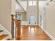 Grand foyer featuring hardwood floors, high ceilings, and natural light at 3150 Seven Oaks Dr, Cumming, GA 30041