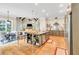 Spacious open concept kitchen with stainless appliances, wooden floors, and an island with barstool seating at 3150 Seven Oaks Dr, Cumming, GA 30041