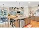 Open kitchen with modern appliances and view of the living area at 3150 Seven Oaks Dr, Cumming, GA 30041