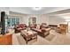 Spacious living room featuring plush leather seating and neutral decor at 3150 Seven Oaks Dr, Cumming, GA 30041