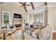Cozy living room with a stone fireplace and vaulted ceilings at 3150 Seven Oaks Dr, Cumming, GA 30041