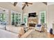 Bright living room with fireplace and large windows at 3150 Seven Oaks Dr, Cumming, GA 30041