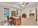 Home office featuring carpet, natural light, and wood furnishings, offering an inspiring space at 3150 Seven Oaks Dr, Cumming, GA 30041
