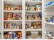 Walk-in pantry with organized shelving for ample storage at 3150 Seven Oaks Dr, Cumming, GA 30041