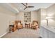 Inviting sitting room featuring built-in shelving and two armchairs at 3150 Seven Oaks Dr, Cumming, GA 30041
