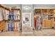 Spacious walk-in closet with custom shelving and clothing racks at 3150 Seven Oaks Dr, Cumming, GA 30041