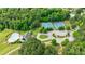 Enjoy the community amenities, including a pool, tennis courts and clubhouse, all set amongst mature trees and lush landscaping at 130 Lapis Lake Pt, Fayetteville, GA 30215