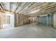 Unfinished basement with exposed framing, showcasing the potential for customization at 130 Lapis Lake Pt, Fayetteville, GA 30215