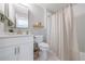Modern bathroom featuring white vanity, subway tile and shower with tub at 130 Lapis Lake Pt, Fayetteville, GA 30215